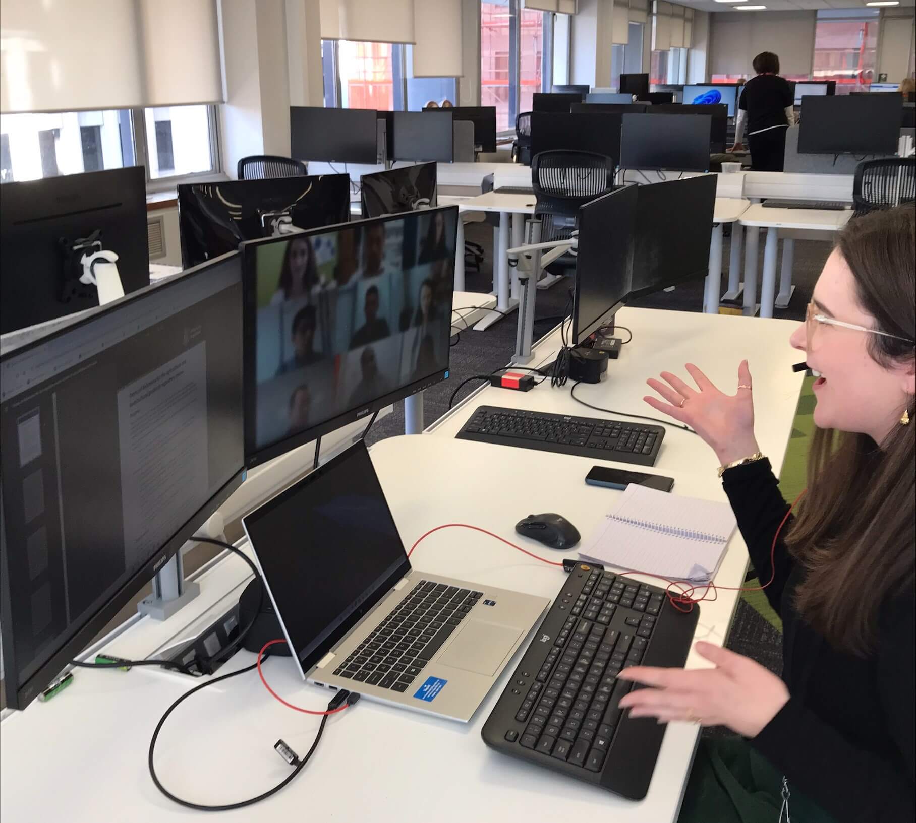 Person sitting at a desk in an office