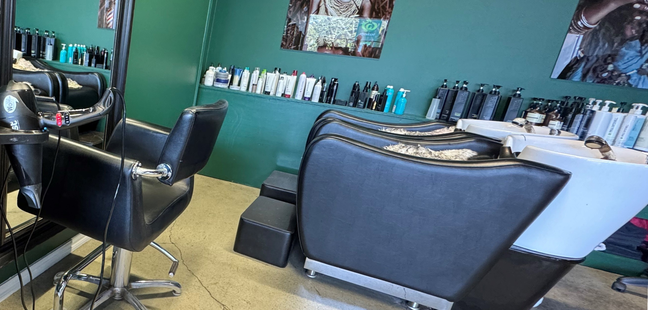 Chairs at a hair washing station in a hairdressing salon